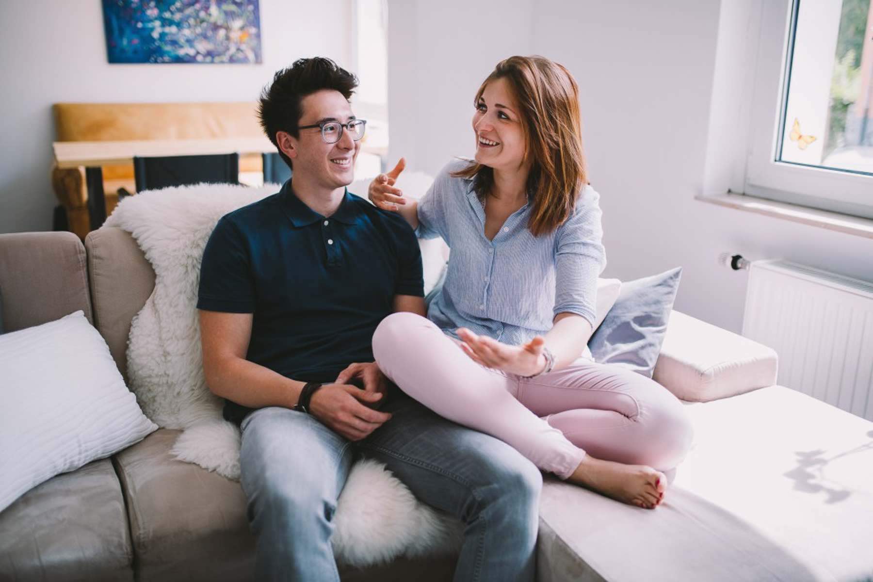 Couple inside discussing their home buying options
