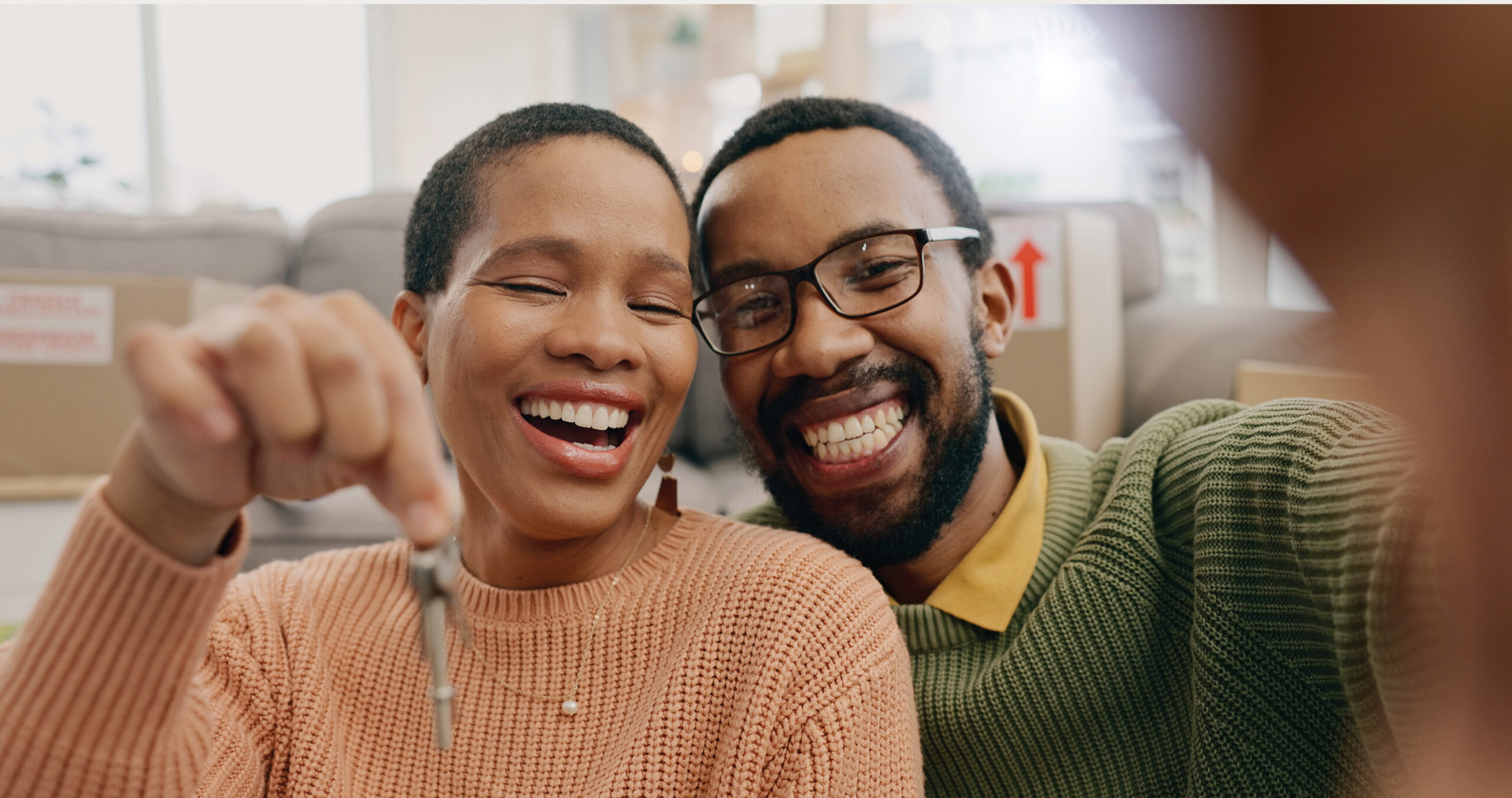 first time home buyers getting keys to home