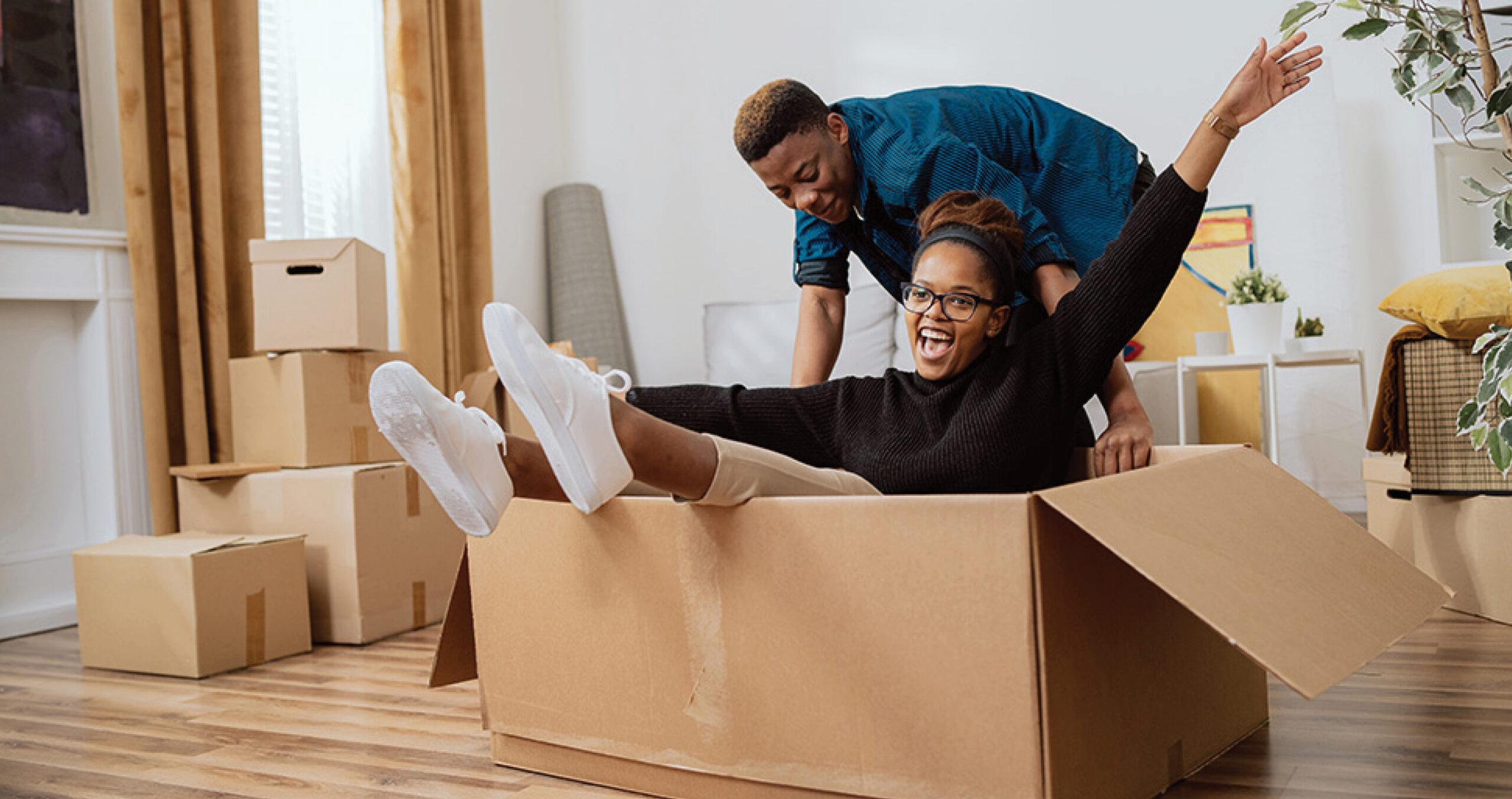 Couple moving into their dream home with an adjustable-rate mortgage (ARM)